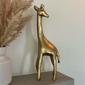 Bronze metal Giraffe. 7.25”x3.5”.
